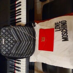 Love Moschino Black Chevron Backpack N Wristlet In Red